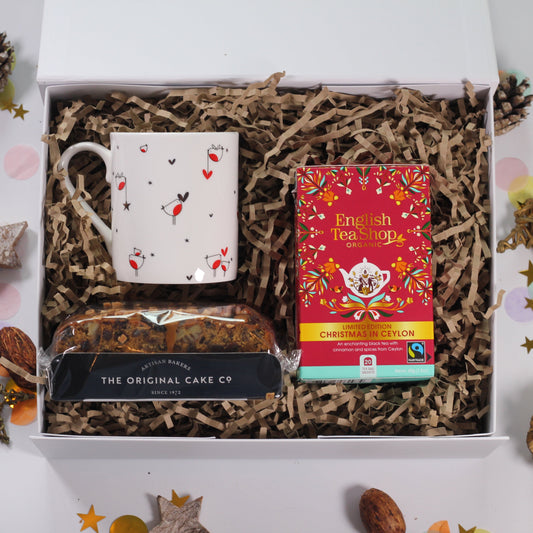 Hug gift box set with robin mug, Christmas tea, and a festive mini cake.