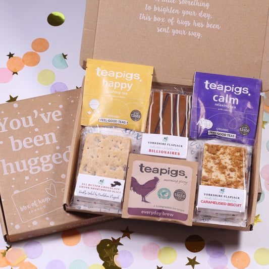 A letterbox gift box containing various Yorkshire flapjack and chocolate shortbread. 