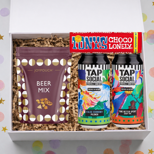 Gift set with beer mix, 'Tap Social' beer cans, and 'Joypouch' product in a box.