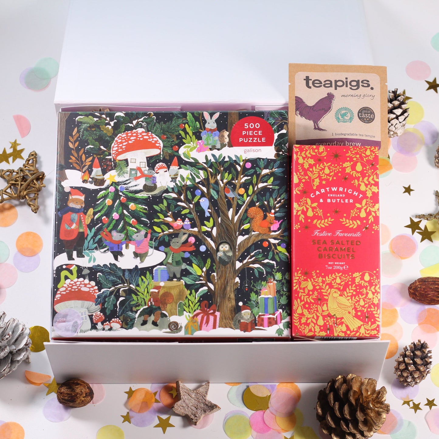 Christmas gift box with Christmas Jigsaw puzzle, sea salted caramel biscuits and tea.