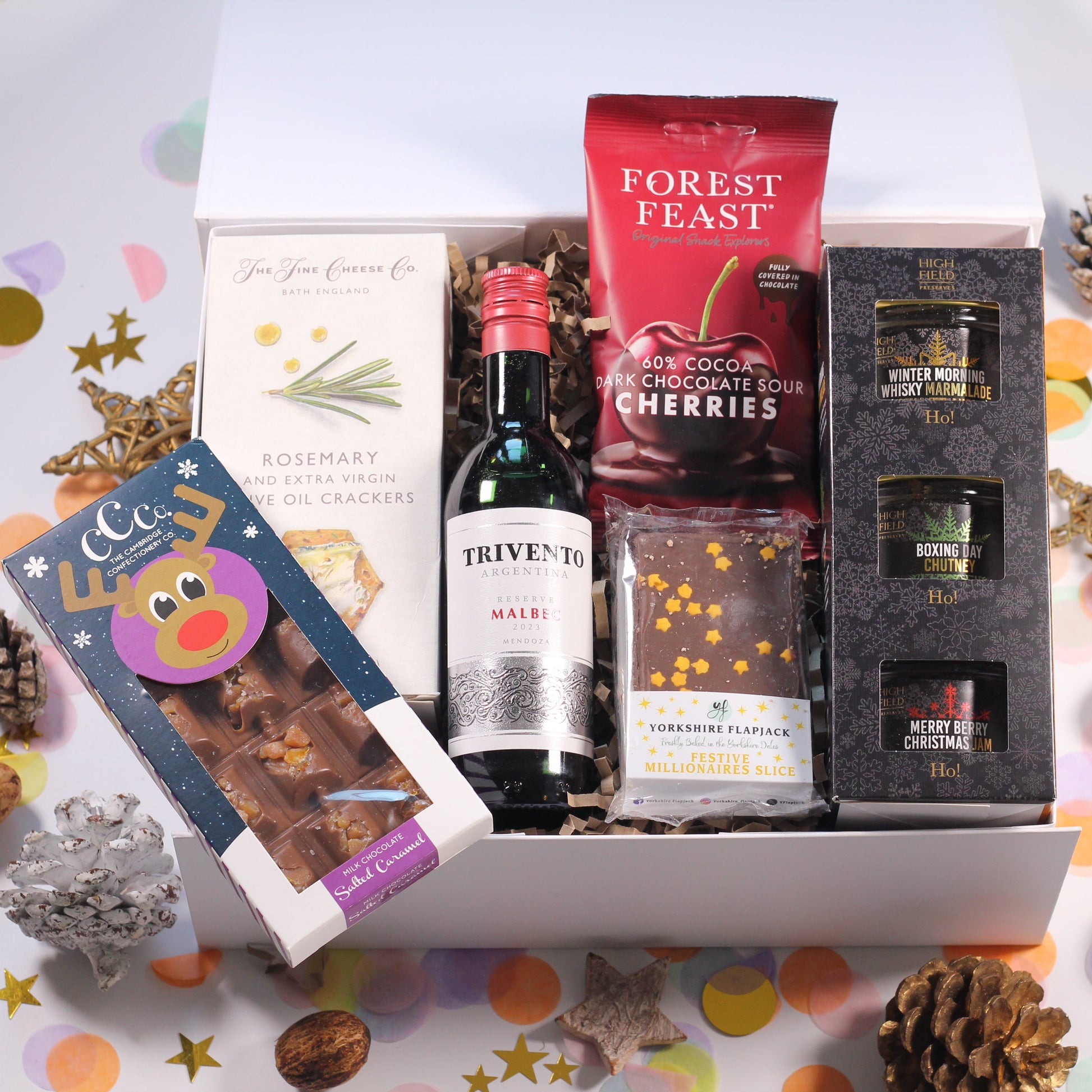 Festive Gift box with wine, chocolate, festive chuntey, chocolate cherries and crackers.