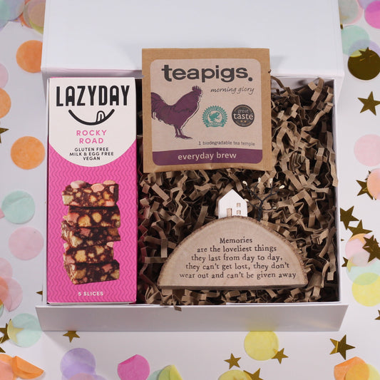 Gift box with Lazyday Rocky Road, Teapigs tea, and a wooden plaque about memories being the loveliest thing.
