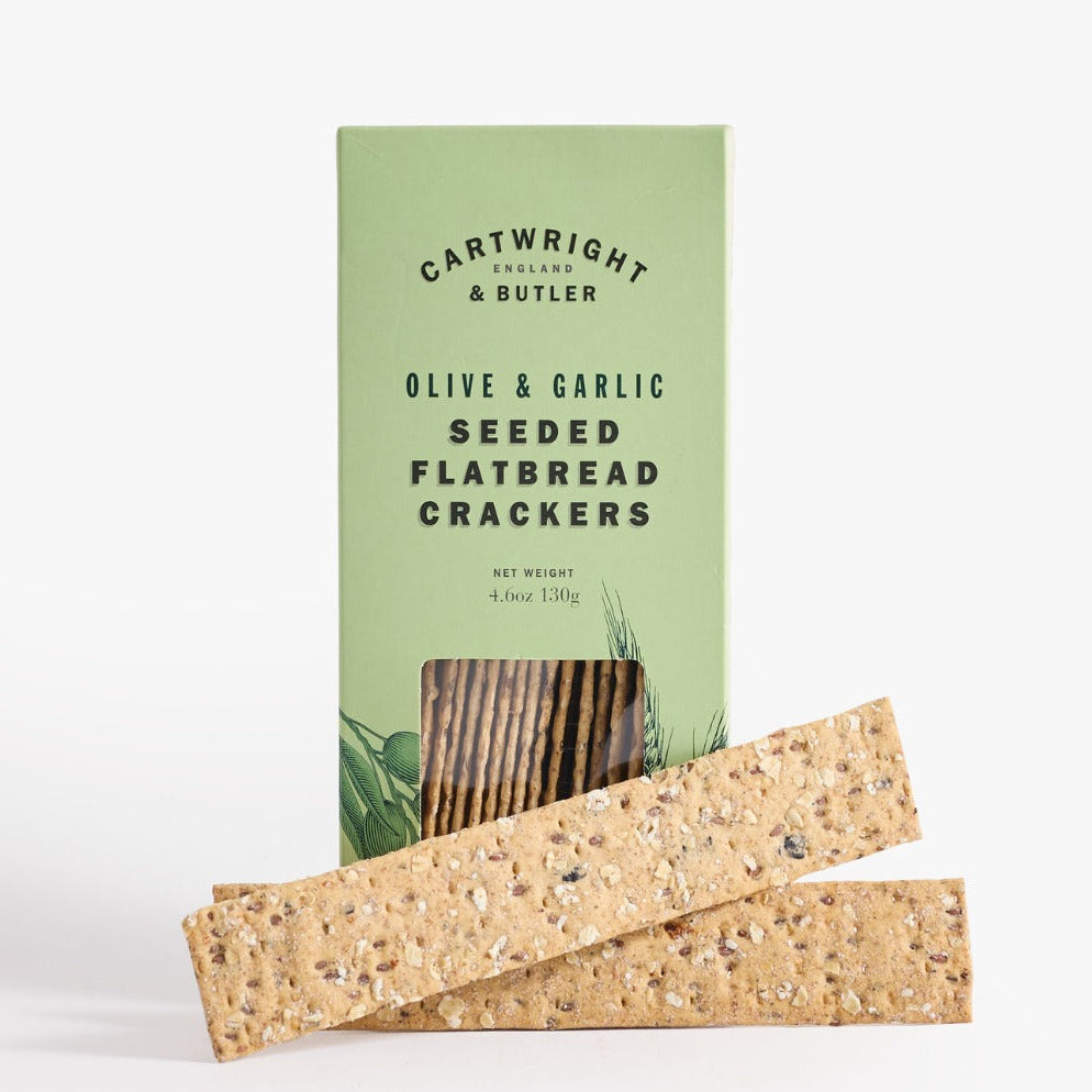 Pack of Cartwright & Butler olive and garlic seeded flatbread crackers on a white background