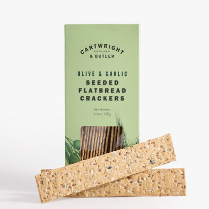 Pack of Cartwright & Butler olive and garlic seeded flatbread crackers on a white background