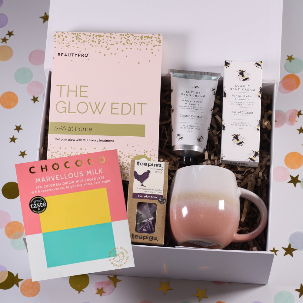 Gift set with a mug, spa at home, chocolate and hand cream.