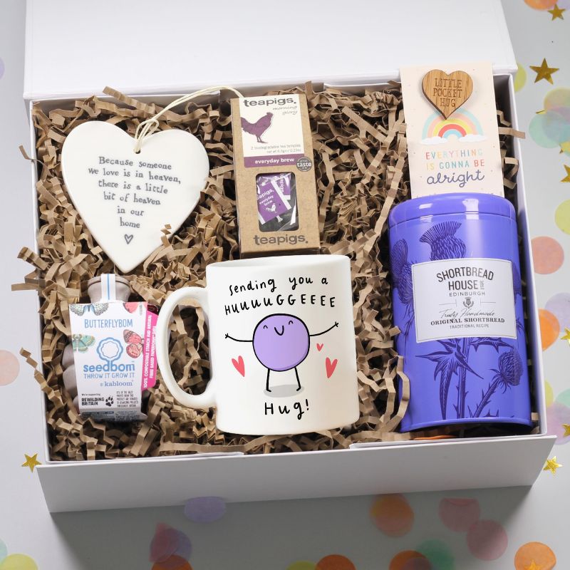 Gift box with a mug, bereavement heart ceramic plaque, tea, shortbread biscuits, butterfly seedbom and pocket token.